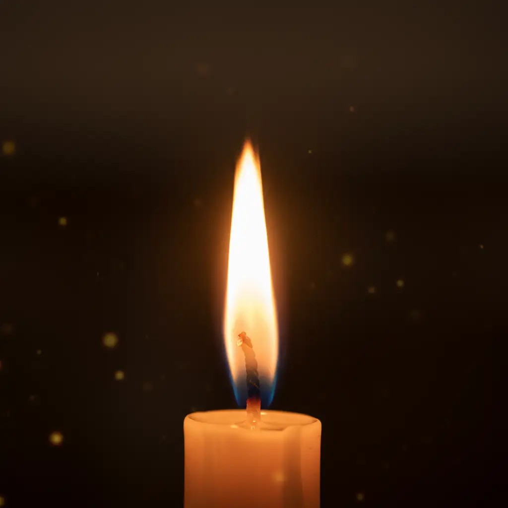 A close-up of a warm, steady candle flame burning in the darkness, symbolizing spiritual guidance and peaceful transition for a loved one.